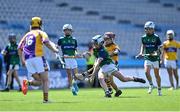 8 June 2022; Oscar Morgan of St Pius X BNS in action against Eoin Wallace of St Laurence's, Kilmacud, in the Corn Marino final during the Allianz Cumann na mBunscoil Hurling Finals in Croke Park, Dublin. Over 2,800 schools and 200,000 students are set to compete in the primary schools competition this year with finals taking place across the country. Allianz and Cumann na mBunscol are also gifting 500 footballs, 200 hurleys and 200 sliotars to schools across the country to welcome Ukrainian students into our national games and local communities. Photo by Piaras Ó Mídheach/Sportsfile