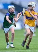 8 June 2022; Joseph Davy of St Laurence's, Kilmacud, in action against David Lombard of St Pius X BNS in the Corn Marino final during the Allianz Cumann na mBunscoil Hurling Finals in Croke Park, Dublin. Over 2,800 schools and 200,000 students are set to compete in the primary schools competition this year with finals taking place across the country. Allianz and Cumann na mBunscol are also gifting 500 footballs, 200 hurleys and 200 sliotars to schools across the country to welcome Ukrainian students into our national games and local communities. Photo by Piaras Ó Mídheach/Sportsfile