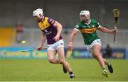 11 June 2022; Oisín Foley of Wexford in action against Eoin Ross of Kerry during the GAA Hurling All-Ireland Senior Championship Preliminary Quarter-Final match between Kerry and Wexford at Austin Stack Park in Tralee, Kerry. Photo by Diarmuid Greene/Sportsfile