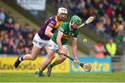 11 June 2022; Eric Leen of Kerry in action against Oisín Foley of Wexford during the GAA Hurling All-Ireland Senior Championship Preliminary Quarter-Final match between Kerry and Wexford at Austin Stack Park in Tralee, Kerry. Photo by Diarmuid Greene/Sportsfile
