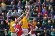 11 June 2022; David Kearney, left, and Eoghan Campbell of Antrim in action against Tim O'Mahony, left, and Séamus Harnedy of Cork during the GAA Hurling All-Ireland Senior Championship Preliminary Quarter-Final match between Antrim and Cork at Corrigan Park in Belfast. Photo by Ramsey Cardy/Sportsfile