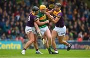 11 June 2022; Conor O'Keeffe of Kerry in action against Conor McDonald and Jack O'Connor of Wexford during the GAA Hurling All-Ireland Senior Championship Preliminary Quarter-Final match between Kerry and Wexford at Austin Stack Park in Tralee, Kerry. Photo by Diarmuid Greene/Sportsfile