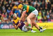 11 June 2022; Conor O'Keeffe of Kerry and Conor McDonald of Wexford tussle off the ball during the GAA Hurling All-Ireland Senior Championship Preliminary Quarter-Final match between Kerry and Wexford at Austin Stack Park in Tralee, Kerry. Photo by Diarmuid Greene/Sportsfile