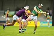 11 June 2022; Conor Devitt of Wexford breaks his hurley while blocking a shot from Podge Boyle of Kerry during the GAA Hurling All-Ireland Senior Championship Preliminary Quarter-Final match between Kerry and Wexford at Austin Stack Park in Tralee, Kerry. Photo by Diarmuid Greene/Sportsfile