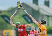 11 June 2022; Robert O'Flynn of Cork and Joe Maskey of Antrim during the GAA Hurling All-Ireland Senior Championship Preliminary Quarter-Final match between Antrim and Cork at Corrigan Park in Belfast. Photo by Ramsey Cardy/Sportsfile