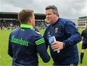 11 June 2022; Kerry manager Stephen Molumphy and Wexford manager Darragh Egan exchange a handshake after the GAA Hurling All-Ireland Senior Championship Preliminary Quarter-Final match between Kerry and Wexford at Austin Stack Park in Tralee, Kerry. Photo by Diarmuid Greene/Sportsfile