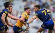 11 June 2022; Keelan Sexton of Clare in action against Roscommon players, from left, Brian Stack, Enda Smith and Ronan Daly during the GAA Football All-Ireland Senior Championship Round 2 match between Clare and Roscommon at Croke Park in Dublin. Photo by Piaras Ó Mídheach/Sportsfile