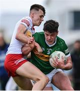 11 June 2022; Eddie Healy of Kerry in action against Conan Devlin of Tyrone during the Electric Ireland GAA Football All-Ireland Minor Championship Quarter-Final match between Tyrone and Kerry at MW Hire O'Moore Park in Portlaoise, Laois. Photo by David Fitzgerald/Sportsfile