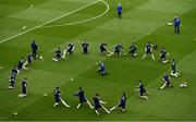 11 June 2022; The Scotland team warm up before the UEFA Nations League B group 1 match between Republic of Ireland and Scotland at the Aviva Stadium in Dublin. Photo by Ben McShane/Sportsfile