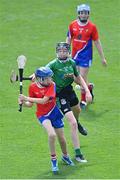 8 June 2022; Ben Kilgallon of Belgrove BNS in action against Sean Lynch of Scoil Mhuire, Lucan, during the Corn Herald final at the Allianz Cumann na mBunscoil Hurling Finals in Croke Park, Dublin. Over 2,800 schools and 200,000 students are set to compete in the primary schools competition this year with finals taking place across the country. Allianz and Cumann na mBunscol are also gifting 500 footballs, 200 hurleys and 200 sliotars to schools across the country to welcome Ukrainian students into our national games and local communities. Photo by Piaras Ó Mídheach/Sportsfile