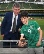 11 June 2022; Republic of Ireland manager Stephen Kenny poses for a selfie with a supporter before the UEFA Nations League B group 1 match between Republic of Ireland and Scotland at the Aviva Stadium in Dublin. Photo by Stephen McCarthy/Sportsfile