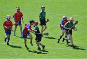 8 June 2022; Elliot Keane of Scoil Mhuire, Lucan, in action against Zachery Dunwoody of Belgrove BNS during the Corn Herald final at the Allianz Cumann na mBunscoil Hurling Finals in Croke Park, Dublin. Over 2,800 schools and 200,000 students are set to compete in the primary schools competition this year with finals taking place across the country. Allianz and Cumann na mBunscol are also gifting 500 footballs, 200 hurleys and 200 sliotars to schools across the country to welcome Ukrainian students into our national games and local communities. Photo by Piaras Ó Mídheach/Sportsfile
