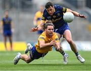 11 June 2022; Cian O'Dea of Clare passes under pressure from Ciaráin Murtagh of Roscommon during the GAA Football All-Ireland Senior Championship Round 2 match between Clare and Roscommon at Croke Park in Dublin. Photo by Piaras Ó Mídheach/Sportsfile