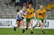 11 June 2022; Aine O'Neill of Waterford in action against Deirdre Foley, left, and Evelyn McGinley of Donegal during the TG4 All-Ireland Ladies Football Senior Championship Group D - Round 1 match between Donegal and Waterford at St Brendan's Park in Birr, Offaly. Photo by Sam Barnes/Sportsfile