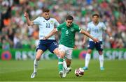 11 June 2022; Josh Cullen of Republic of Ireland is tackled by Ryan Christie of Scotland during the UEFA Nations League B group 1 match between Republic of Ireland and Scotland at the Aviva Stadium in Dublin. Photo by Stephen McCarthy/Sportsfile