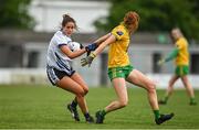 11 June 2022; Hannah Power of Waterford in action against Deirdre Foley of Donegal during the TG4 All-Ireland Ladies Football Senior Championship Group D - Round 1 match between Donegal and Waterford at St Brendan's Park in Birr, Offaly. Photo by Sam Barnes/Sportsfile
