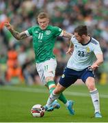 11 June 2022; Anthony Ralston of Scotland in action against James McClean of Republic of Ireland during the UEFA Nations League B group 1 match between Republic of Ireland and Scotland at the Aviva Stadium in Dublin. Photo by Stephen McCarthy/Sportsfile