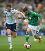 11 June 2022; Troy Parrott of Republic of Ireland and Jack Hendry of Scotland during the UEFA Nations League B group 1 match between Republic of Ireland and Scotland at the Aviva Stadium in Dublin. Photo by Stephen McCarthy/Sportsfile