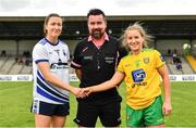 11 June 2022; Captains Karen McGrath of Waterford, left, and Niamh McLaughlin of Donegal, right, shake hands infront of referee Seamus Mulvihill before the TG4 All-Ireland Ladies Football Senior Championship Group D - Round 1 match between Donegal and Waterford at St Brendan's Park in Birr, Offaly. Photo by Sam Barnes/Sportsfile