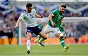 11 June 2022; Scott Hogan of Republic of Ireland in action against Scott McKenna of Scotland during the UEFA Nations League B group 1 match between Republic of Ireland and Scotland at the Aviva Stadium in Dublin. Photo by Seb Daly/Sportsfile