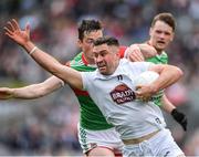 11 June 2022; Ben McCormack of Kildare is tackled by Stephen Coen of Mayo during the GAA Football All-Ireland Senior Championship Round 2 match between Mayo and Kildare at Croke Park in Dublin. Photo by Ray McManus/Sportsfile