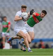 11 June 2022; Kevin O'Callaghan of Kildare in action against Enda Hession of Mayo during the GAA Football All-Ireland Senior Championship Round 2 match between Mayo and Kildare at Croke Park in Dublin. Photo by Ray McManus/Sportsfile
