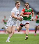 11 June 2022; Daniel Flynn of Kildare in action against Eoghan McLaughlin of Mayo during the GAA Football All-Ireland Senior Championship Round 2 match between Mayo and Kildare at Croke Park in Dublin. Photo by Ray McManus/Sportsfile