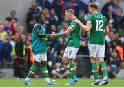 11 June 2022; Republic of Ireland players, from left, Michael Obafemi, James McClean and Nathan Collins after their side's victory in the UEFA Nations League B group 1 match between Republic of Ireland and Scotland at the Aviva Stadium in Dublin. Photo by Seb Daly/Sportsfile