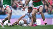 11 June 2022; Ben McCormack of Kildare gathers possession ahead of Mayo players Oisín Mullin, right, and Pádraig O'Horan, before referee Derek O'Mahoney gave a free against him for picking the ball off the ground during the GAA Football All-Ireland Senior Championship Round 2 match between Mayo and Kildare at Croke Park in Dublin. Photo by Piaras Ó Mídheach/Sportsfile