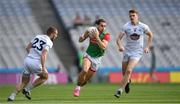 11 June 2022; Oisín Mullin of Mayo in action against Nei, left, and Kevin O'Callaghan of Kildare  Flynn during the GAA Football All-Ireland Senior Championship Round 2 match between Mayo and Kildare at Croke Park in Dublin. Photo by Ray McManus/Sportsfile