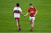 11 June 2022; Ed Myers of Cork and Cahair Spiers of Derry shake hands after the Electric Ireland GAA Football All-Ireland Minor Championship Quarter-Final match between Cork and Derry at MW Hire O'Moore Park in Portlaoise, Laois. Photo by David Fitzgerald/Sportsfile