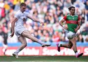 11 June 2022; Daniel Flynn of Kildare takes a shot on goal as Oisín Mullin of Mayo looks on during the GAA Football All-Ireland Senior Championship Round 2 match between Mayo and Kildare at Croke Park in Dublin. Photo by Piaras Ó Mídheach/Sportsfile