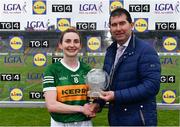 11 June 2022; Cáit Lynch of Kerry receives the Player of the Match award from LGFA President Mícheál Naughton after the TG4 All-Ireland Ladies Football Senior Championship Group C - Round 1 match between Kerry and Galway at St Brendan's Park in Birr, Offaly. Photo by Sam Barnes/Sportsfile