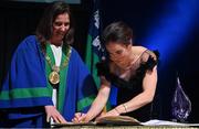 11 June 2022; Olympic boxing gold medallist Kellie Harrington signs the roll of honour upon being conferred with the Honorary Freedom of the City of Dublin by Lord Mayor of Dublin Alison Gilliland at a ceremony in the Mansion House, Dublin. Photo by Brendan Moran/Sportsfile
