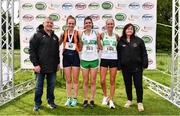 12 June 2022; Athletics Ireland Chair of Finance and Risk Michael Quinlan, left, and Athletics Ireland Road Running Coordinator Bernie Dunne, right, with Women's national championship medallists, from left, Sile O'Byrne of Sli Cualann AC, Wicklow, silver, Kate Purcell of Raheny Shamrocks, gold, and Zoe Quinn of Raheny Shamrock AC, Dublin, bronze, during the Irish Runner 5 Mile incorporating the AAI National 5 Mile Championships at Phoenix Park in Dublin. Photo by Sam Barnes/Sportsfile