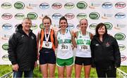 12 June 2022; Athletics Ireland Chair of Finance and Risk Michael Quinlan, left, and Athletics Ireland Road Running Coordinator Bernie Dunne, right, with Women's national championship medallists, from left, Sile O'Byrne of Sli Cualann AC, Wicklow, silver, Kate Purcell of Raheny Shamrocks, gold, and Zoe Quinn of Raheny Shamrock AC, Dublin, bronze, during the Irish Runner 5 Mile incorporating the AAI National 5 Mile Championships at Phoenix Park in Dublin. Photo by Sam Barnes/Sportsfile