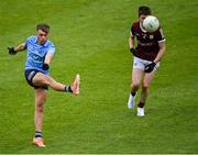 12 June 2022; Joe Quigley of Dublin scores a point as Vinny Gill of Galway closes in during the Electric Ireland GAA Football All-Ireland Minor Championship Quarter-Final match between Dublin and Galway at O'Connor Park in Tullamore, Offaly. Photo by Piaras Ó Mídheach/Sportsfile