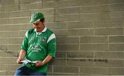 12 June 2022; Limerick supporter Gary Kelly from Kilcolman in Limerick studies the match day programme before the GAA Football All-Ireland Senior Championship Round 2 match between between Cork and Limerick at Páirc Ui Chaoimh in Cork. Photo by Eóin Noonan/Sportsfile