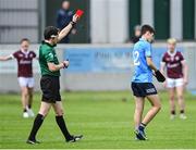 12 June 2022; Referee David Murnane shows the red card to Luke O'Boyle of Dublin, after showing a second yellow card, during the Electric Ireland GAA Football All-Ireland Minor Championship Quarter-Final match between Dublin and Galway at O'Connor Park in Tullamore, Offaly. Photo by Piaras Ó Mídheach/Sportsfile