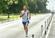 12 June 2022; John Fitzgibbon of Thurles Crokes AC, Tipperary, during the Irish Runner 5 Mile incorporating the AAI National 5 Mile Championships at Phoenix Park in Dublin. Photo by Sam Barnes/Sportsfile