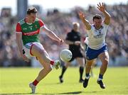 4 June 2022; Matthew Ruane of Mayo shoots under pressure from Ryan Wylie of Monaghan during the GAA Football All-Ireland Senior Championship Round 1 match between Mayo and Monaghan at Hastings Insurance MacHale Park in Castlebar, Mayo. Photo by Piaras Ó Mídheach/Sportsfile