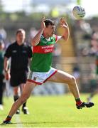 4 June 2022; Diarmuid O'Connor of Mayo keeps the ball in play close to the sideline during the GAA Football All-Ireland Senior Championship Round 1 match between Mayo and Monaghan at Hastings Insurance MacHale Park in Castlebar, Mayo. Photo by Piaras Ó Mídheach/Sportsfile