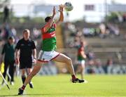 4 June 2022; Diarmuid O'Connor of Mayo keeps the ball in play close to the sideline during the GAA Football All-Ireland Senior Championship Round 1 match between Mayo and Monaghan at Hastings Insurance MacHale Park in Castlebar, Mayo. Photo by Piaras Ó Mídheach/Sportsfile