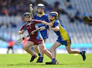 8 June 2022; Jamie O'Leary of St Fiachra's NS Beamount in action against Garbhan Burke of St Patrick's BNS Drumcondra, right, in the Corn FODH final during the Allianz Cumann na mBunscoil Hurling Finals in Croke Park, Dublin. Over 2,800 schools and 200,000 students are set to compete in the primary schools competition this year with finals taking place across the country. Allianz and Cumann na mBunscol are also gifting 500 footballs, 200 hurleys and 200 sliotars to schools across the country to welcome Ukrainian students into our national games and local communities. Photo by Piaras Ó Mídheach/Sportsfile