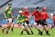 8 June 2022; Ben Ó Catháin of Scoil Oilibhéir, Coolmine, in action against Holy Trinity SNS, during the Corn Ryder cup final at the Allianz Cumann na mBunscoil Hurling Finals in Croke Park, Dublin. Over 2,800 schools and 200,000 students are set to compete in the primary schools competition this year with finals taking place across the country. Allianz and Cumann na mBunscol are also gifting 500 footballs, 200 hurleys and 200 sliotars to schools across the country to welcome Ukrainian students into our national games and local communities. Photo by Piaras Ó Mídheach/Sportsfile