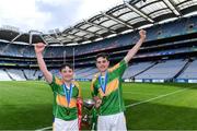 8 June 2022; Scoil Olibheir, Coolmine, captains Senan Ó Broin, right, and Riain de Búrca celebrate after beating Holy Trinity SNS in the Corn Tom Ryder final at the Allianz Cumann na mBunscoil Hurling Finals in Croke Park, Dublin. Over 2,800 schools and 200,000 students are set to compete in the primary schools competition this year with finals taking place across the country. Allianz and Cumann na mBunscol are also gifting 500 footballs, 200 hurleys and 200 sliotars to schools across the country to welcome Ukrainian students into our national games and local communities. Photo by Piaras Ó Mídheach/Sportsfile