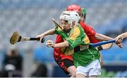 8 June 2022; Rian Mac Aodha Bhuí of Scoil Oilibheir, Coolmine, in action against Holy Trinity SNS in the Corn Tom Ryder cup final during the Allianz Cumann na mBunscoil Hurling Finals in Croke Park, Dublin. Over 2,800 schools and 200,000 students are set to compete in the primary schools competition this year with finals taking place across the country. Allianz and Cumann na mBunscol are also gifting 500 footballs, 200 hurleys and 200 sliotars to schools across the country to welcome Ukrainian students into our national games and local communities. Photo by Piaras Ó Mídheach/Sportsfile