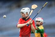 8 June 2022; Dara Abernethy of Holy Trinity SNS in action against Scoil Oilibhéir, Coolmine, during the Corn Ryder cup final at the Allianz Cumann na mBunscoil Hurling Finals in Croke Park, Dublin. Over 2,800 schools and 200,000 students are set to compete in the primary schools competition this year with finals taking place across the country. Allianz and Cumann na mBunscol are also gifting 500 footballs, 200 hurleys and 200 sliotars to schools across the country to welcome Ukrainian students into our national games and local communities. Photo by Piaras Ó Mídheach/Sportsfile