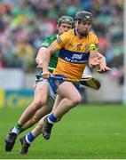 5 June 2022; Tony Kelly of Clare in action against William O'Donoghue of Limerick during the Munster GAA Hurling Senior Championship Final match between Limerick and Clare at FBD Semple Stadium in Thurles, Tipperary. Photo by Brendan Moran/Sportsfile