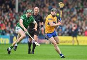 5 June 2022; Tony Kelly of Clare in action against William O'Donoghue of Limerick during the Munster GAA Hurling Senior Championship Final match between Limerick and Clare at FBD Semple Stadium in Thurles, Tipperary. Photo by Brendan Moran/Sportsfile